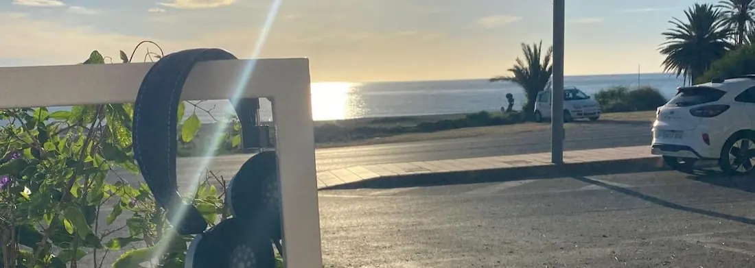 HeadPhones with a sea view - on the railings BANNER