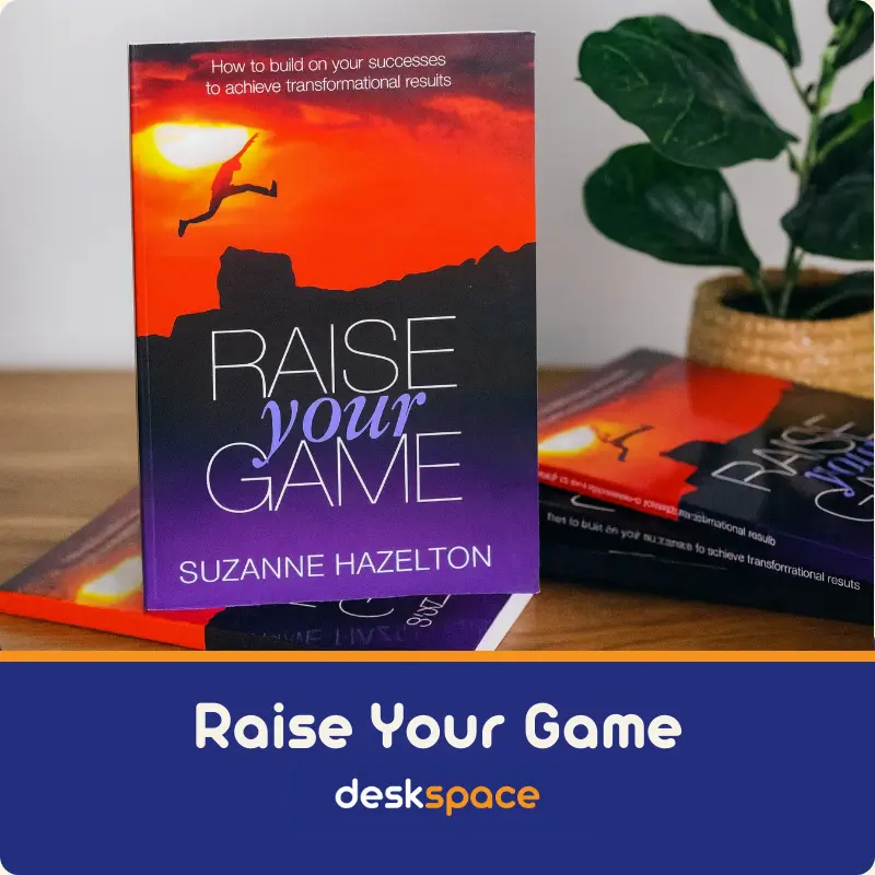 DeskSpace co-owner Suzanne is author of a couple of books. This picture shows copies of Raise Your Game